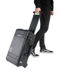 Peli 1510 case being pulled like a trolley suitcase.