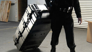 Peli 1780RF Rifle Case - Being pulled while rolling on its edge castor wheels