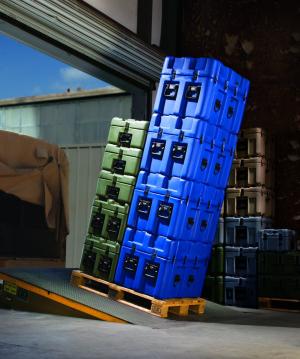 Peli ISP2 Rotomoulded Cases stacked on a Europallet on a slope