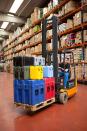 Peli ISP2 Rotomoulded Cases stacked on Europallet on a forklift