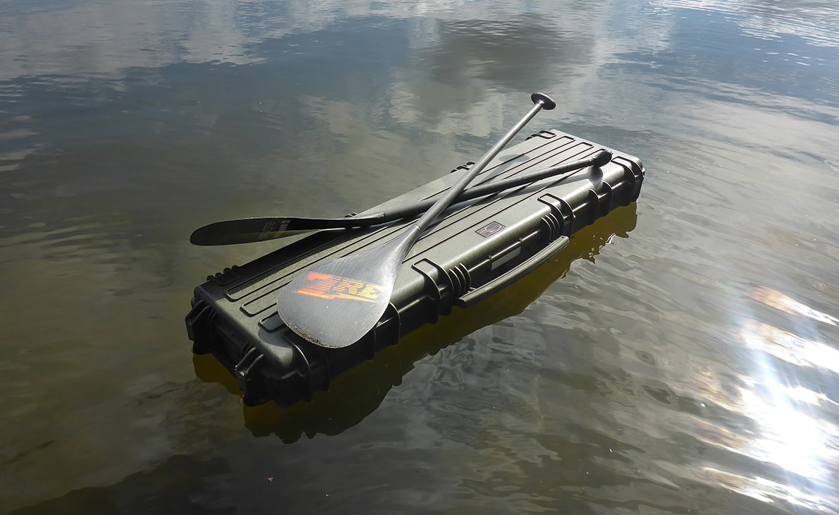 Explorer Waterproof Case used as a paddle board in the Yukon
